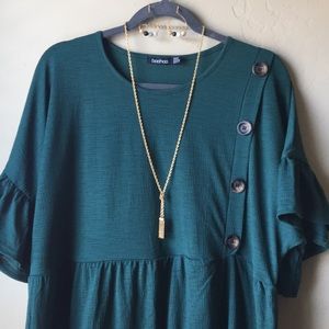 Forest green tunic with button details
